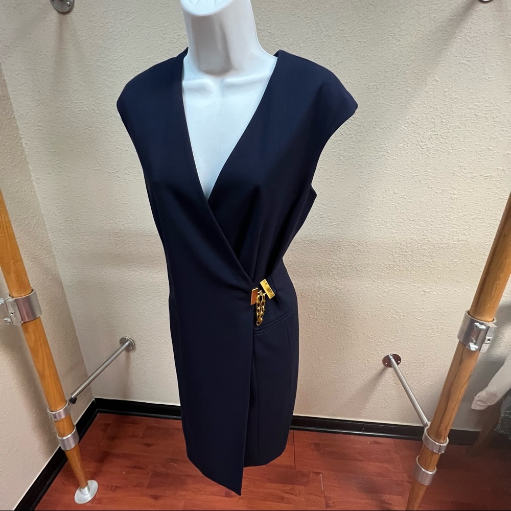 Navy blue v neck dress with gold link